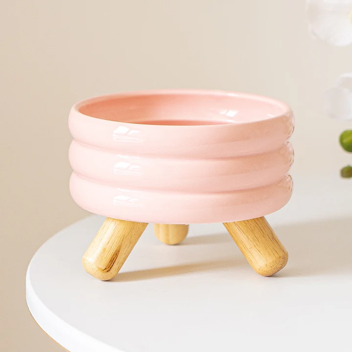 comedero rosado de ceramica